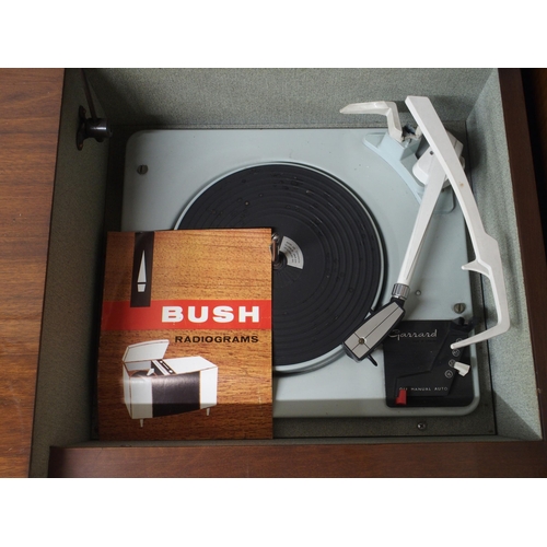 73 - A mid 20th century Bush radiogram with Garrard turntable, 73cm high x 122cm wide x 40cm deep