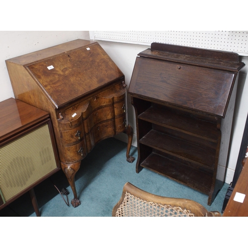 74 - A lot comprising 20th century walnut veneered serpentine front bureau and an oak shallow bureau (2)