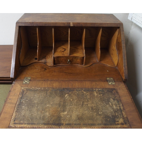 74 - A lot comprising 20th century walnut veneered serpentine front bureau and an oak shallow bureau (2)