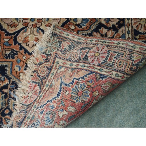 60 - A lot comprising dark blue ground keshan rug with beige central medallion and spandrels, 136cm long ... 