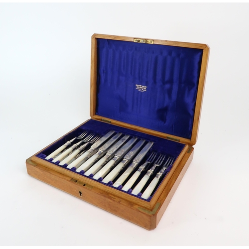 2458 - A CASED SET OF EDWARDIAN SILVER & MOTHER OF PEARL FISH KNIVES & FORKSby William Hutton &... 