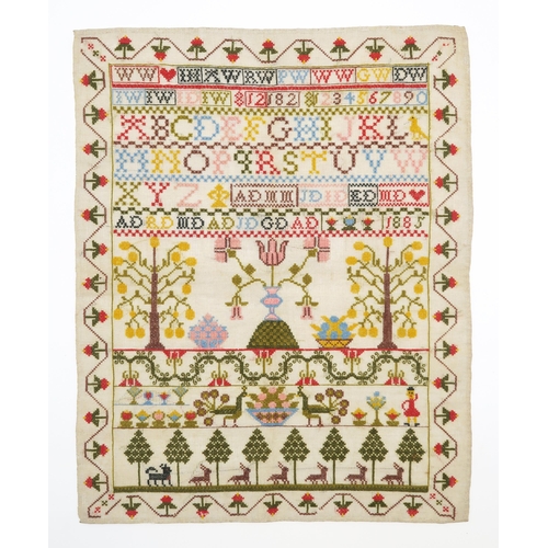 2551 - A VICTORIAN NEEDLEWORK SAMPLERDated 1885, unmounted and unusually well-preserved, the field embroide... 