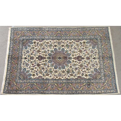 2138 - A CREAM GROUND MESHED RUGwith multicolour flower head central medallion, matching spandrels and flow... 