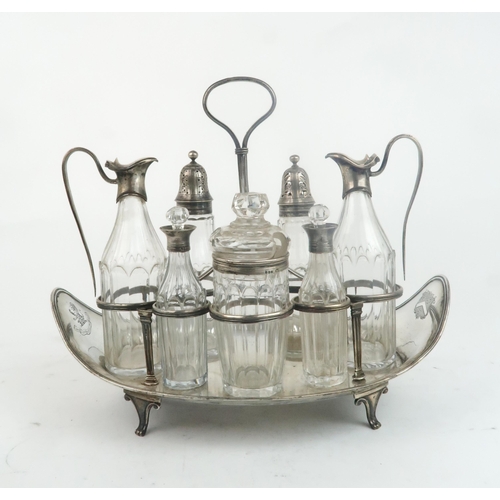 2468 - A GEORGE III SILVER CRUET STANDby Robert Hennell I, London 1792, of everted oval form, with seven ci... 