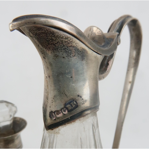 2468 - A GEORGE III SILVER CRUET STANDby Robert Hennell I, London 1792, of everted oval form, with seven ci... 