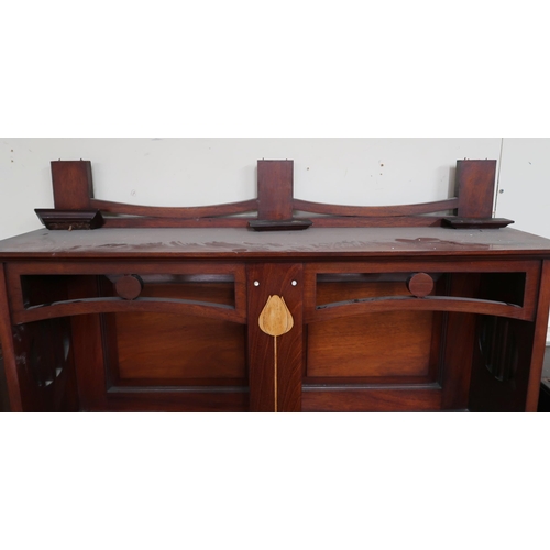 11 - A late Victorian mahogany and satinwood Arts & Crafts bookcase with open shelved superstructure ... 