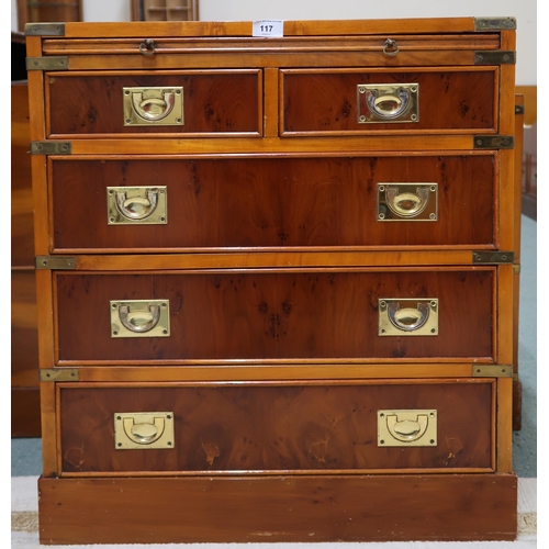 117 - A 20th century campaign style chest of drawers with pull out writing slide over two short drawers ov... 