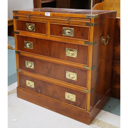 117 - A 20th century campaign style chest of drawers with pull out writing slide over two short drawers ov... 