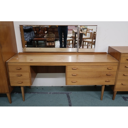 120 - A mid 20th century teak Alfred Cox bedroom suite comprising two door wardrobe, 176cm high x 123cm wi... 