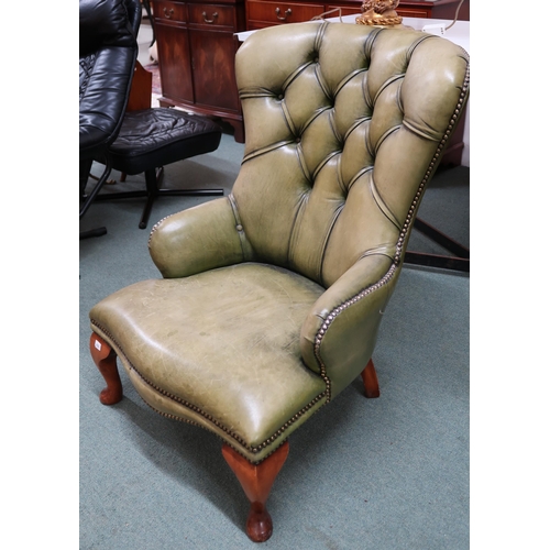 136 - A contemporary green button back leather upholstered lounge chair, gilt figural table lamp in the fo... 