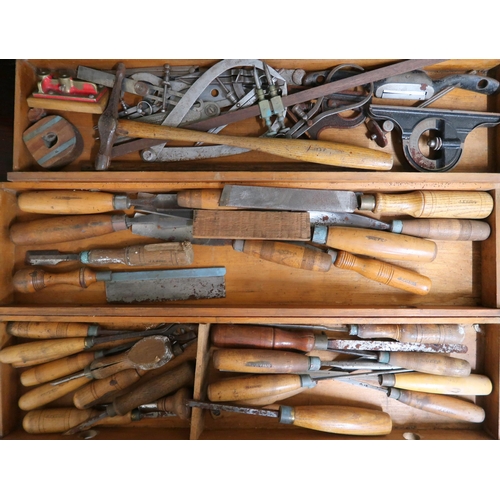 137 - A tool chest with assorted contents and a wood bound travel trunk (2)