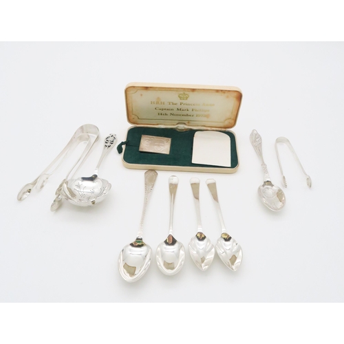 357 - A collection of silver flatware including a tea strainer, by Emile Viner, Sheffield, a silver christ... 