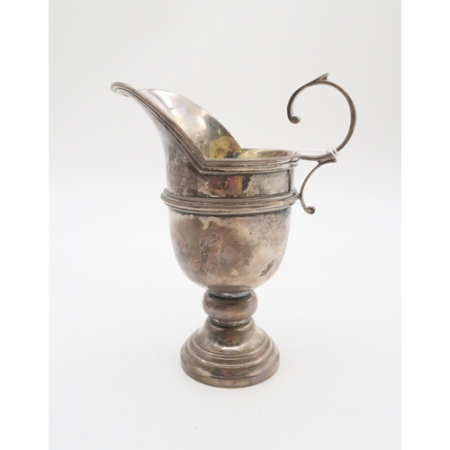 360 - An Elizabeth II silver ewer, by Joseph Gloster Ltd, Birmingham 1975, of helmet form, with a knopped ... 