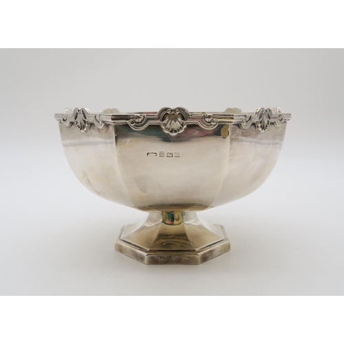 378 - A George VI silver rose bowl, by Joseph Gloster Ltd, Birmingham 1973 (anniversary mark), of faceted ... 