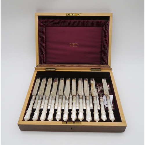 380 - A cased set of silver bladed and mother of pearl handled fish knives and forks, (one knife and fork ... 