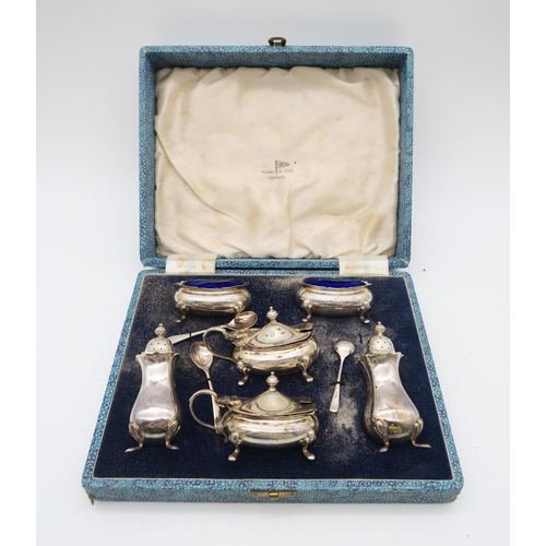 381 - A cased six piece silver cruet set, by Walker & Hall, Sheffield 1955, with shaped edges, on pad ... 