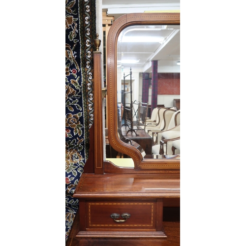 39 - An Edwardian mahogany bedroom suite comprising mirror doored wardrobe, 205cm high x 144cm wide x 53c... 