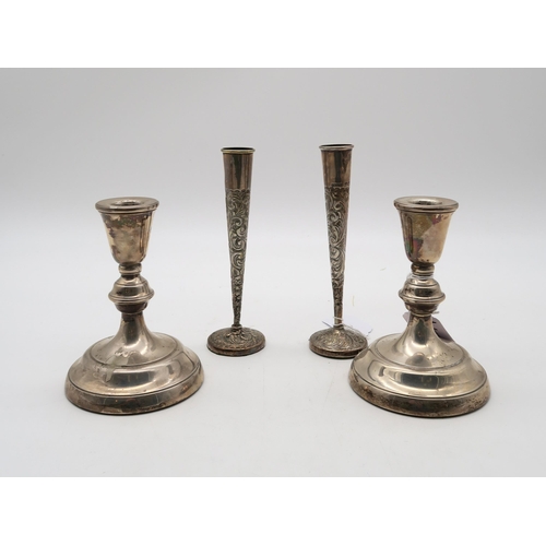 390 - A pair of silver candlesticks, by Parkin Silversmiths Ltd, Birmingham, 1979 (bases loaded) and a pai... 