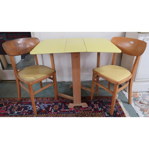 59 - A mid 20th century Formica topped dining suite comprising drop end table, two Centa dining chairs an... 