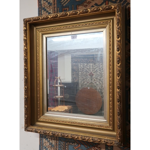 6 - A 20th century gilt framed reproduction wall mirror, 75cm high x 65cm wide 