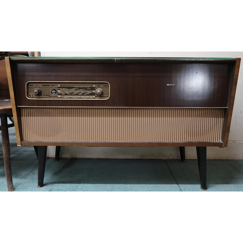 60 - A mid 20th century R.G.D stereophonic radiogram with integrated Monarch turntable, 72cm high x 112cm... 