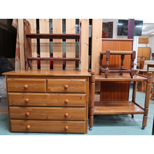 64 - A lot comprising a 20th century pine two over three chest of drawers, two tier tea trolley, oak book... 