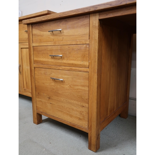 95 - A contemporary oak pedestal desk three drawer pedestal alongside pedestal with single drawer over ca... 