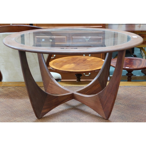 98 - A mid 20th century teak G Plan Astro circular glass inset coffee table on shaped supports, 46cm high... 