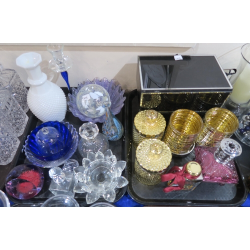 205 - A collection of decorative glassware including candlesticks, lidded jars, tealight holders, glass bo... 