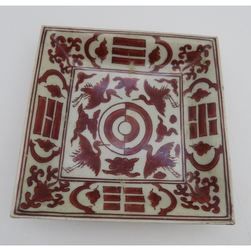 258 - A set of four Chinese iron red 'crane and trigram' square dishes, apocryphal jiajing mark (4)