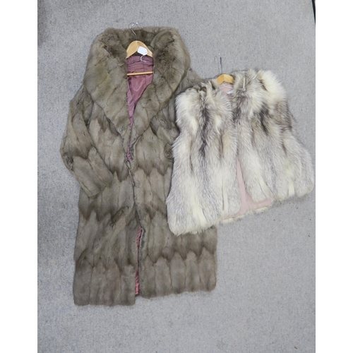 263 - A long grey possibly chinchilla fur coat, a pale fox fur jacket, a long brown fur coat and two other... 