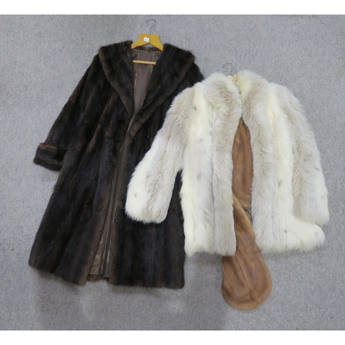 268 - A pale blonde long fur jacket and three other fur coats