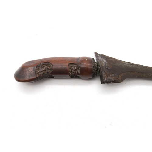 436 - A Malay kris, the straight folded steel blade measuring approx. 34cm in length and housed in a brass... 