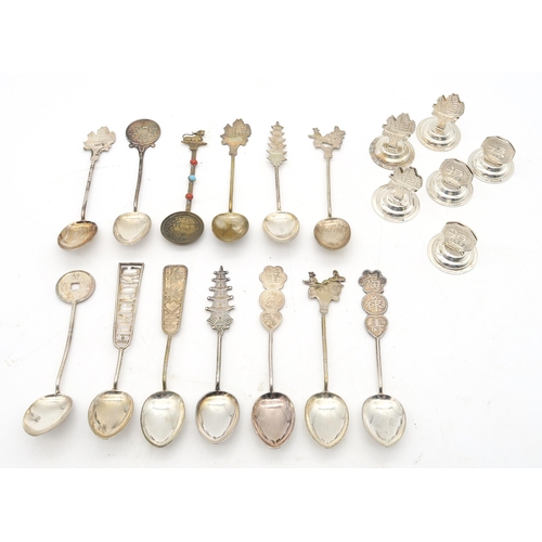 443 - A small quantity of unmarked Hong Kong souvenir teaspoons, together with two trios of similarly styl... 