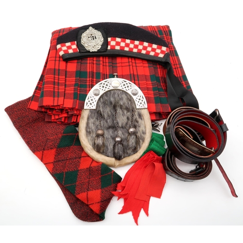 456 - Highland wear, comprising a sealskin sporran, kilt with coordinating woollen hose, an Argyll & S... 