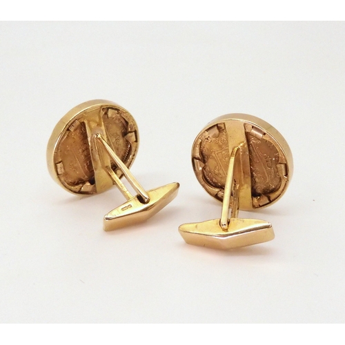 639 - A pair of 1890 - 1892 shield back gold half sovereigns in 9ct gold cufflinks mounts, weight 18gms