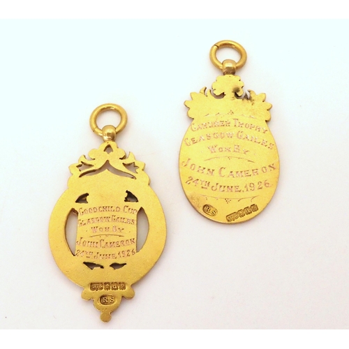 652 - Two 9ct gold Ironmongers and Blacksmiths Association Golfing Cup medallions, both inscribed with an ... 