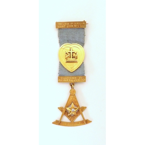 653 - A 9ct gold Masonic medallion, for The Lodge Of Glasgow Saint John No.3 Bis. set with a diamond, Insc... 