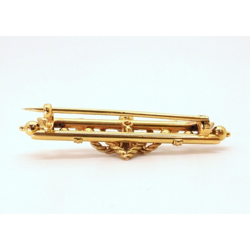 654 - A 15ct gold vintage brooch with a heart motif, length 4.5cm, weight 4gms