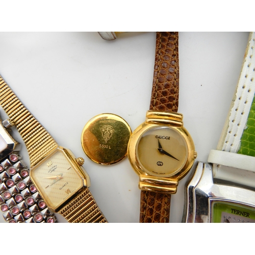 753 - A gold plated ladies Gucci watch, signed to the dial, case and mechanism, serial number 0005474 cali... 