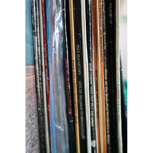 516 - VINYL LP RECORDS two boxes of pop and rock vinyl LP records with Beatles, Bob Dylan, Eurythmics, The... 