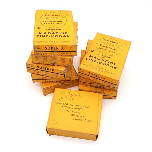 458A - A collection of WW2-era Kodak Cine-film reels, some boxes being titled in pen: 