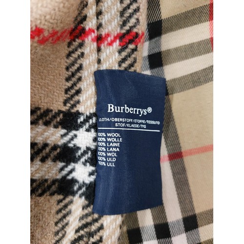 265 - A red Burberry ladies raincoatName: 12 long C87AOrder: E58601/1together with a Mary Quant red and cl... 