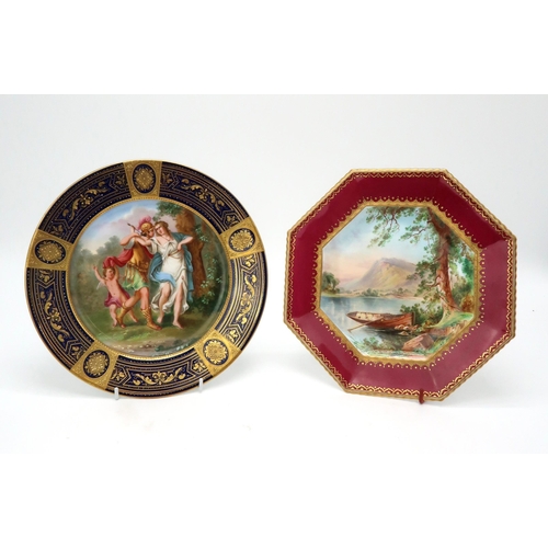 2203 - A COPELAND OCTAGONAL CABINET PLATEwith central painted continental lake scene within a burgundy and ... 