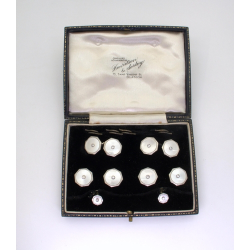 2732 - A SET OF STUDS AND LINKSmounted in 18ct gold and platinum, inlaid with mother of pearl with a centra... 