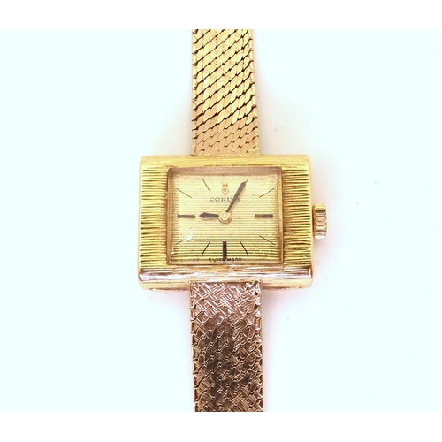 AN 18CT GOLD CORUM WATCH HEADthe gold coloured textured dial with