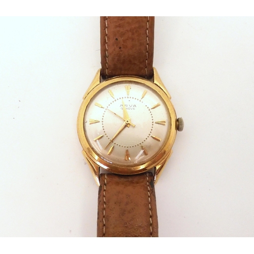 2914 - AN 18CT GOLD ARVA GENEVE WATCH HEADwith silvered dial, gold coloured chevron numerals and dauphin ha... 