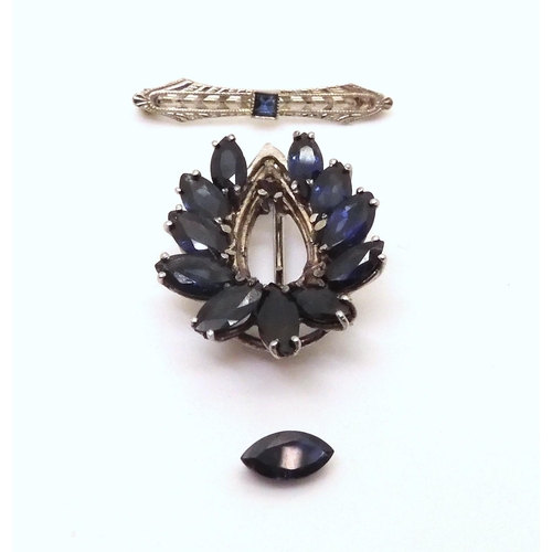 755 - A 10k blue gem brooch, weight 0.6gms, together with a (af) sapphire brooch mounted in white metal, w... 