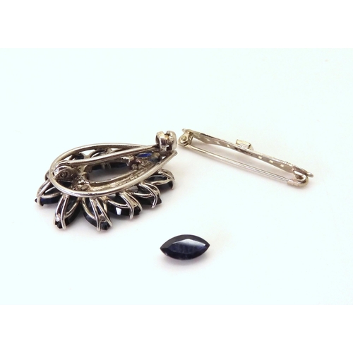 755 - A 10k blue gem brooch, weight 0.6gms, together with a (af) sapphire brooch mounted in white metal, w... 