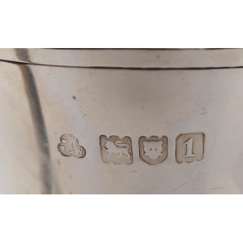 352 - An Edwardian silver twin handled cup, by Wakely & Wheeler, London 1906, engraved with an armoria... 